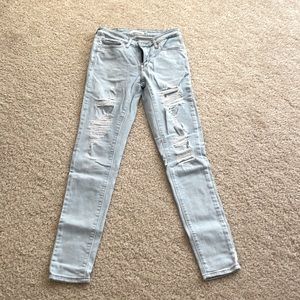 High waisted Levi distressed skinny jeans 24